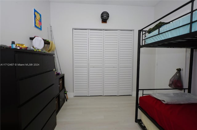 bedroom with light hardwood / wood-style floors