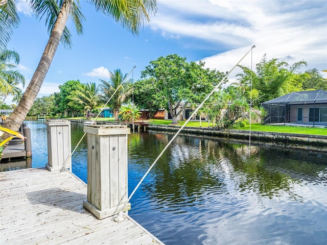 view of dock with a water view