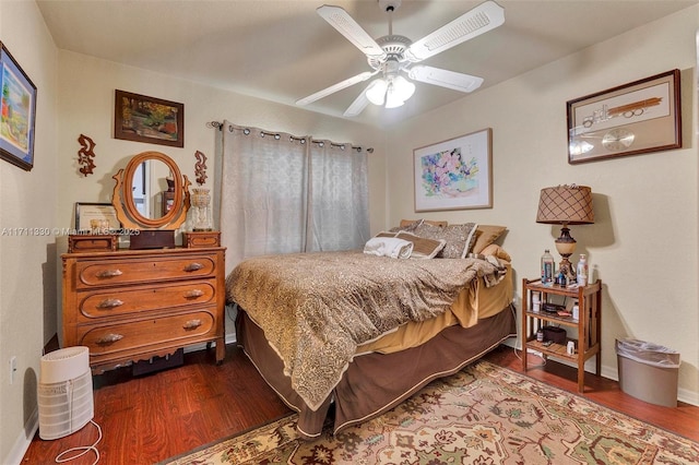 bedroom with ceiling fan and wood-type flooring