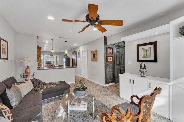 living room with ceiling fan