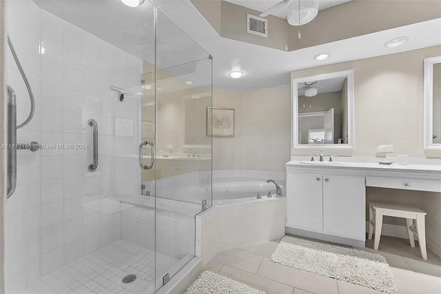 bathroom with tile patterned floors, ceiling fan, shower with separate bathtub, and vanity