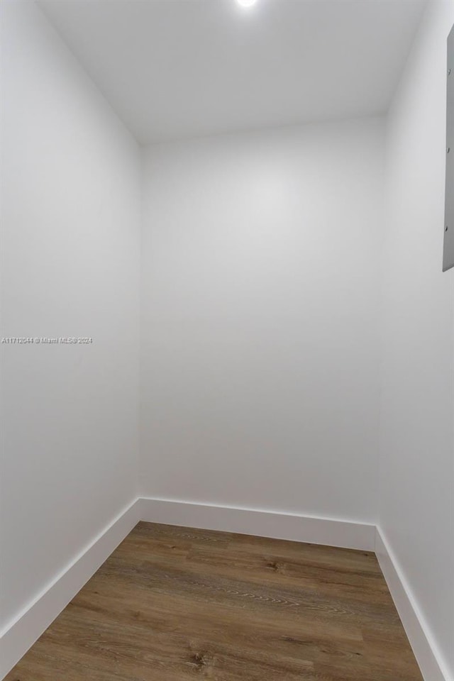 spare room with hardwood / wood-style floors