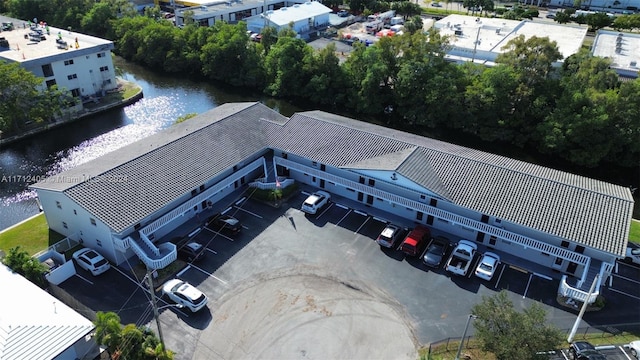 drone / aerial view with a water view