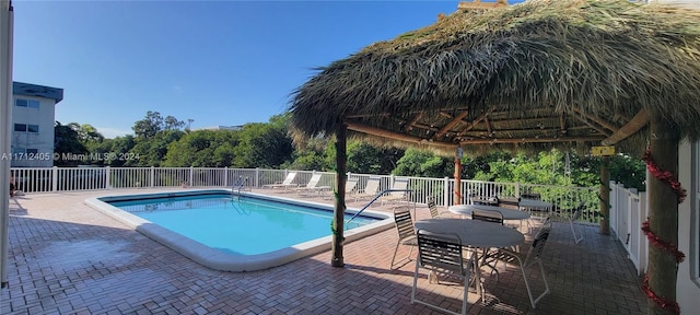 view of pool with a gazebo and a patio