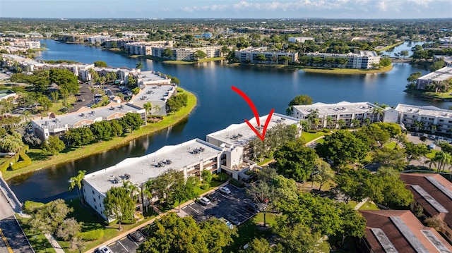 birds eye view of property featuring a water view