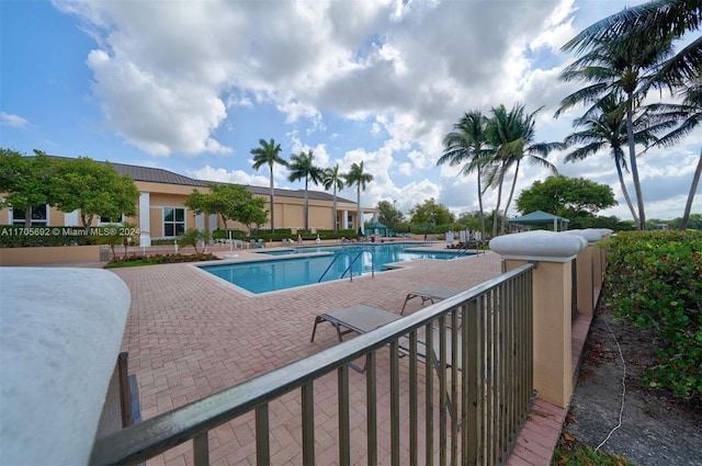 view of pool featuring a patio