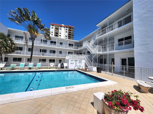 1504 S Surf Rd Unit 57, Hollywood, FL 33019 - community pool with fence and stairway