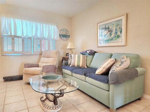 living room with light tile patterned flooring