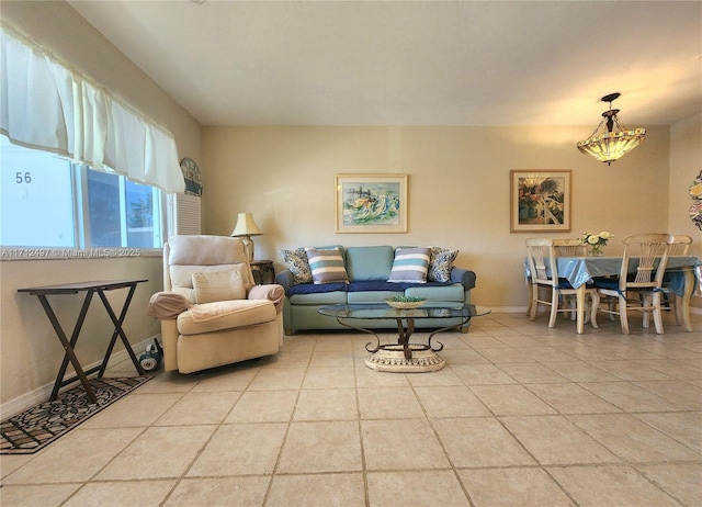 1504 S Surf Rd Unit 57, Hollywood, FL 33019 - tiled living area featuring baseboards