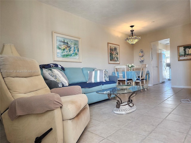 1504 S Surf Rd Unit 57, Hollywood, FL 33019 - living area with light tile patterned floors and baseboards