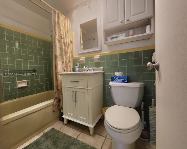 1504 S Surf Rd Unit 57, Hollywood, FL 33019 - full bath with tile patterned floors, toilet, shower / bathtub combination with curtain, vanity, and tile walls