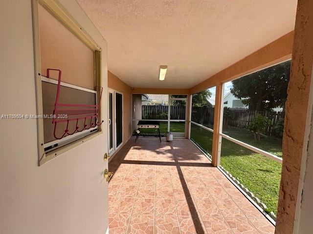 view of unfurnished sunroom