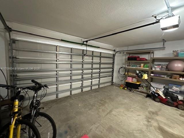 garage featuring a garage door opener