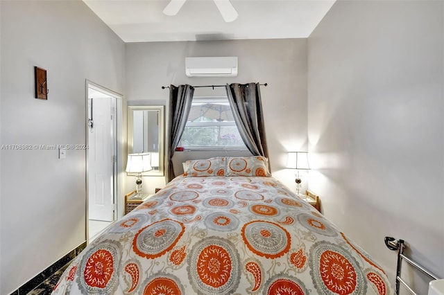 bedroom with ceiling fan and a wall unit AC