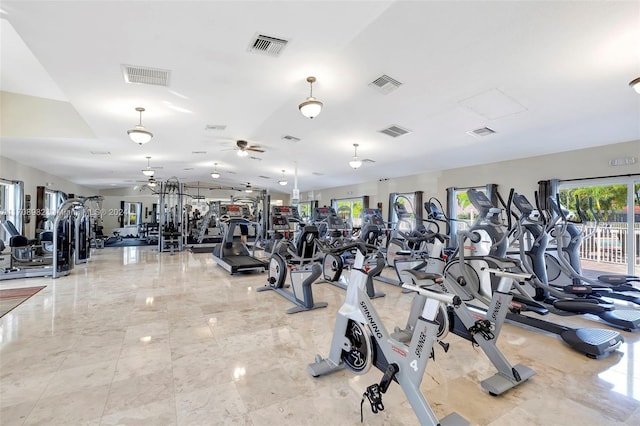 exercise room with ceiling fan