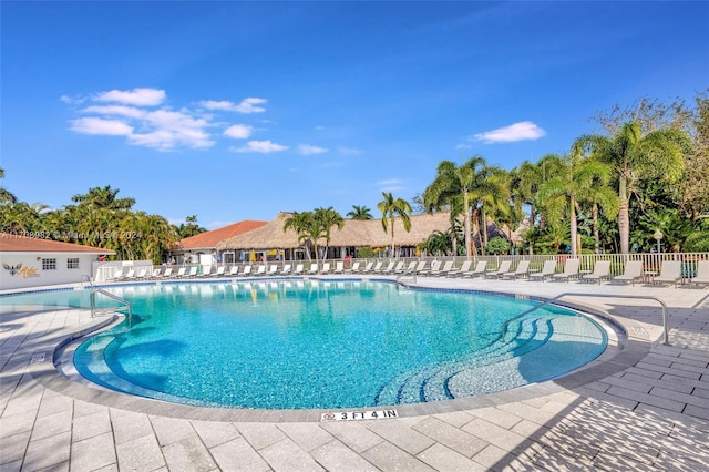 view of swimming pool featuring a patio