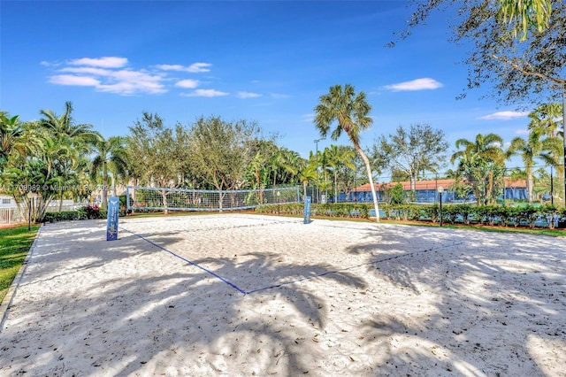 view of home's community featuring volleyball court