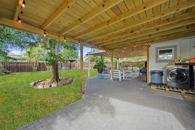 view of patio featuring washer / dryer