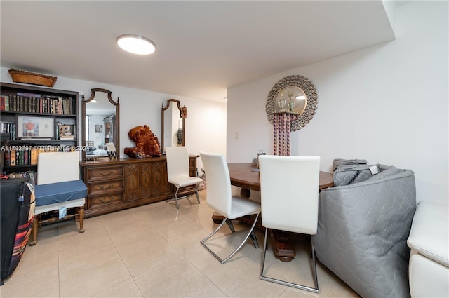 dining area with light tile patterned floors