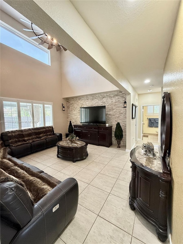 tiled living room with a healthy amount of sunlight