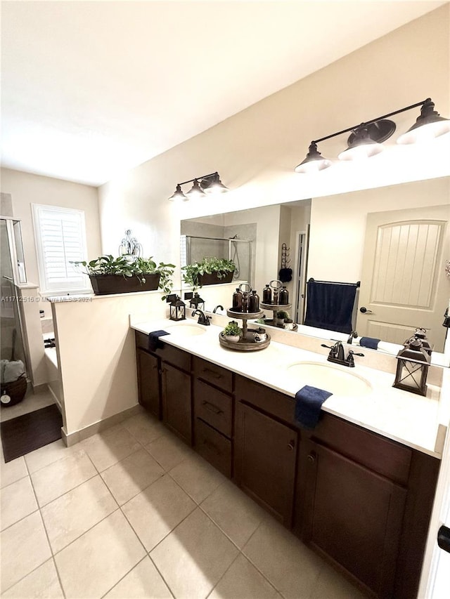 bathroom featuring vanity, tile patterned floors, and an enclosed shower