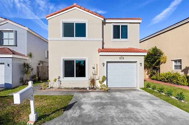 view of front of home with a garage