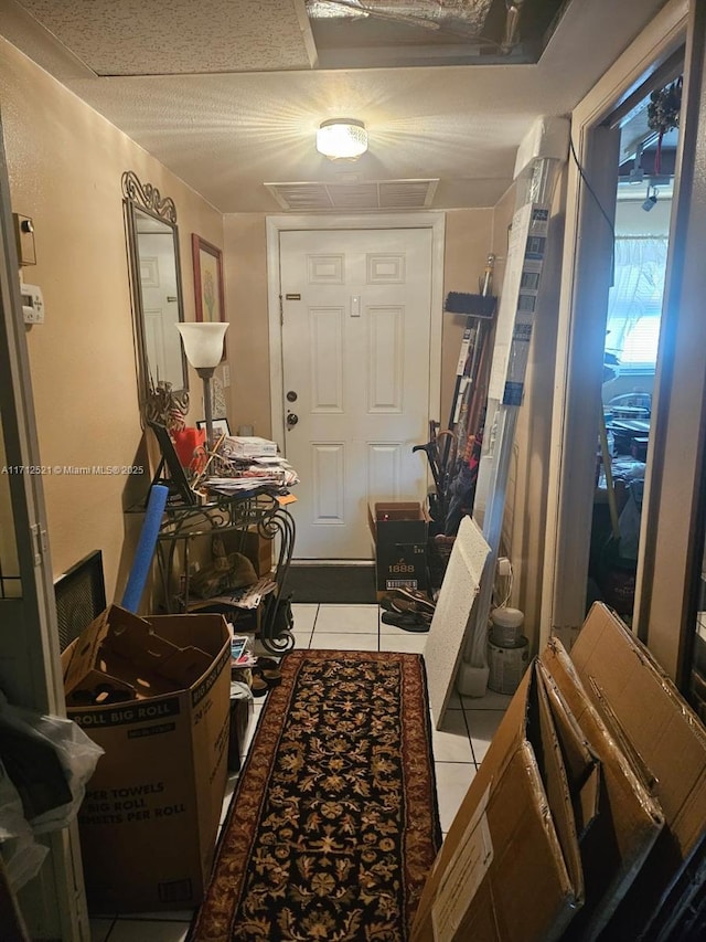 laundry room with stacked washer and clothes dryer