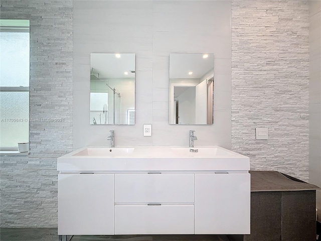 bathroom featuring vanity and walk in shower