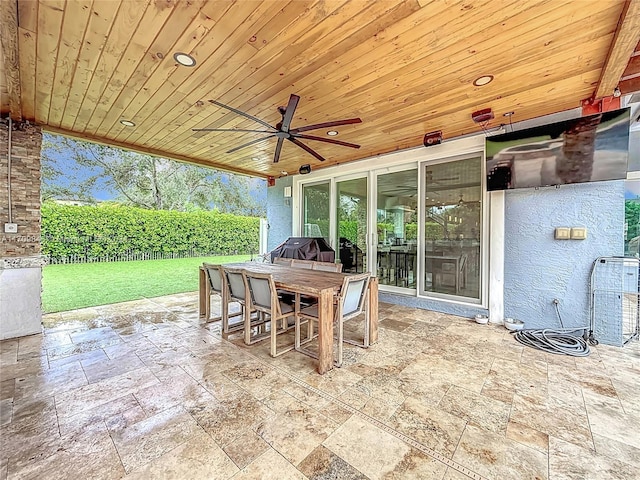 view of patio featuring ceiling fan