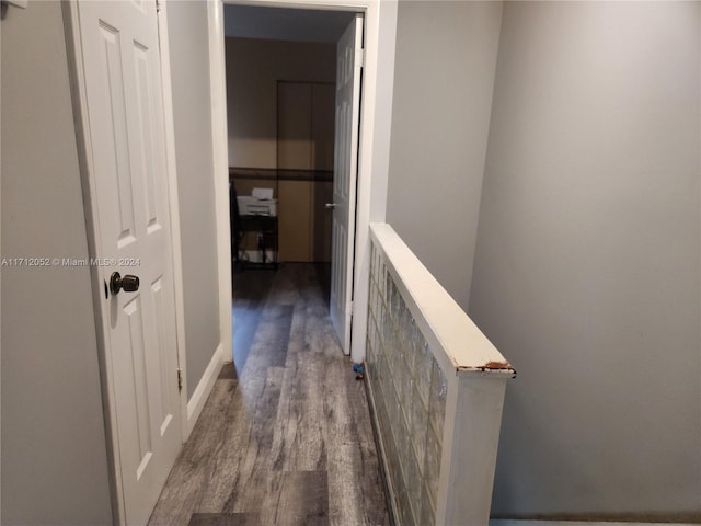 hallway featuring dark hardwood / wood-style floors