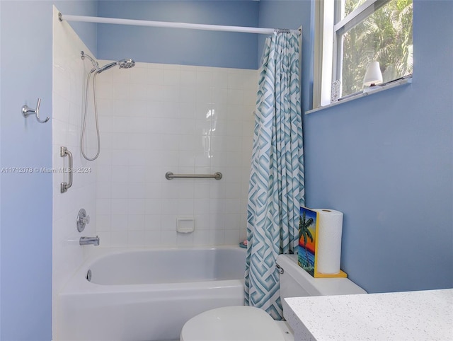 full bathroom featuring vanity, toilet, and shower / bathtub combination with curtain