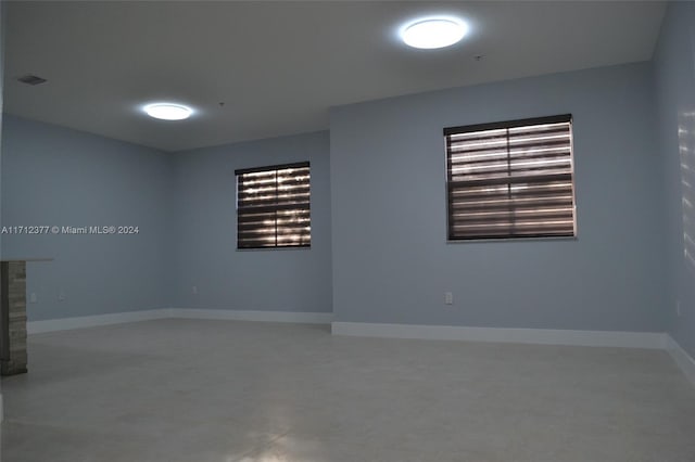 empty room featuring concrete flooring