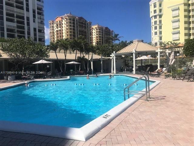 view of pool featuring a gazebo and a patio area