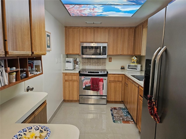 kitchen with appliances with stainless steel finishes