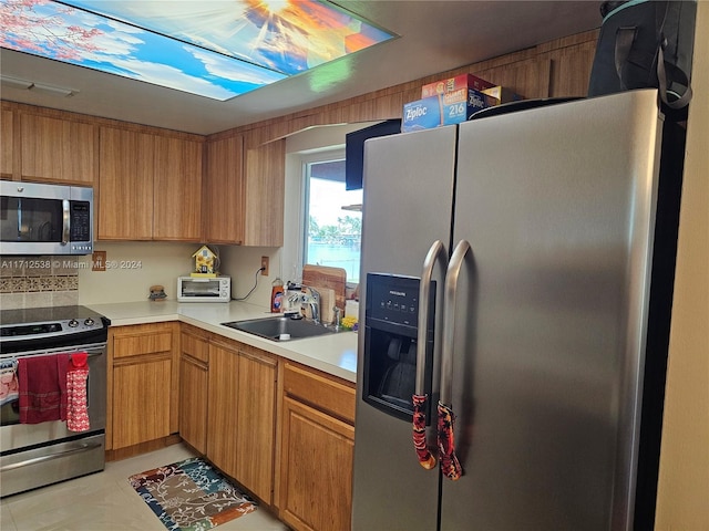 kitchen featuring sink and stainless steel appliances