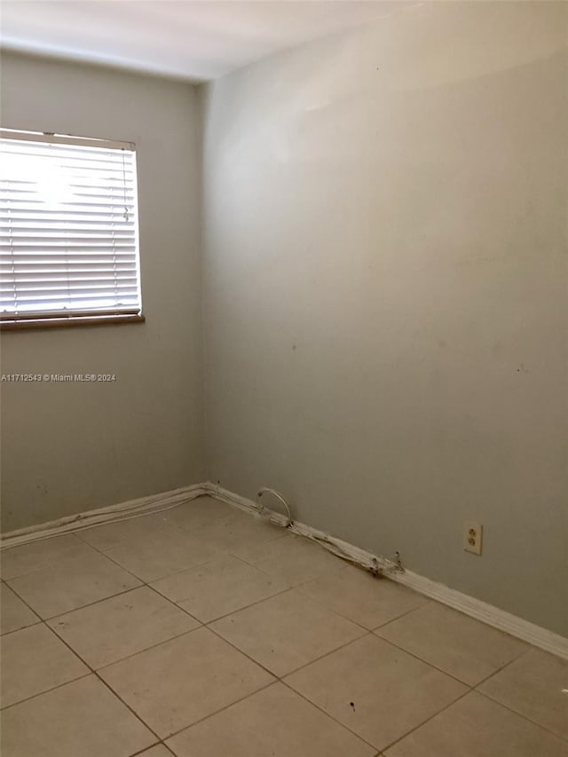 view of tiled empty room