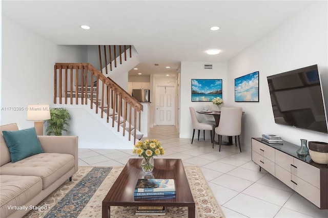 living room with light tile patterned floors