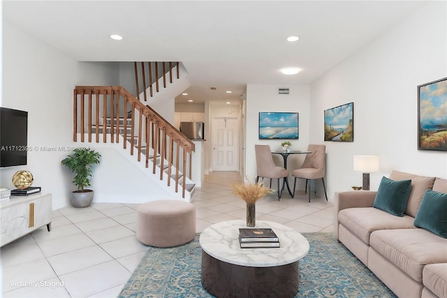 living room with light tile patterned floors