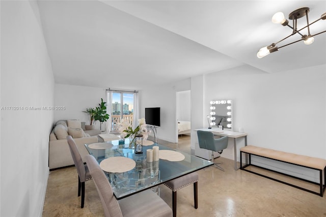 dining room with a notable chandelier