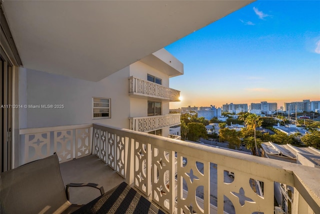 view of balcony at dusk