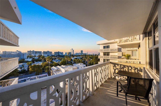 view of balcony at dusk