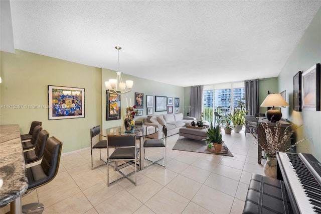 living room featuring floor to ceiling windows, light tile patterned flooring, a notable chandelier, and a textured ceiling