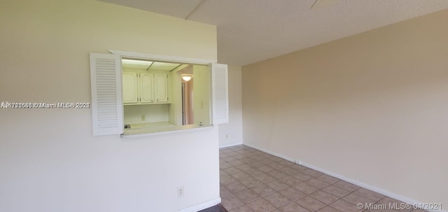 view of tiled empty room