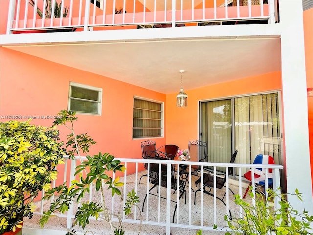 view of patio with a balcony