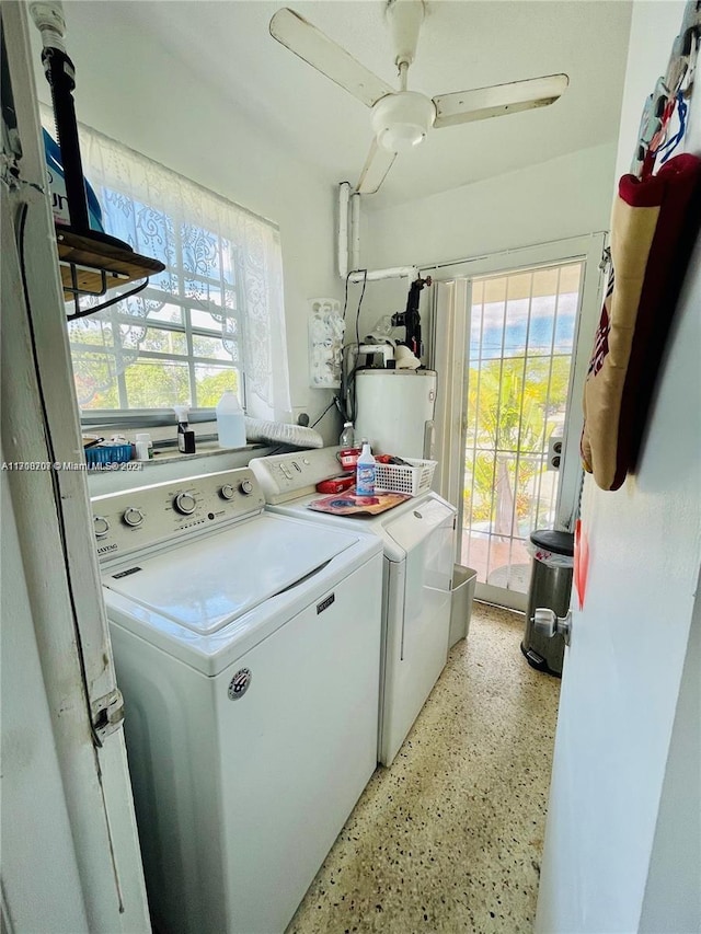 laundry room featuring washer and clothes dryer and water heater