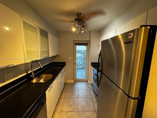 dining area featuring a wall of windows and tile patterned flooring