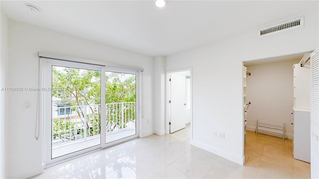 view of tiled spare room