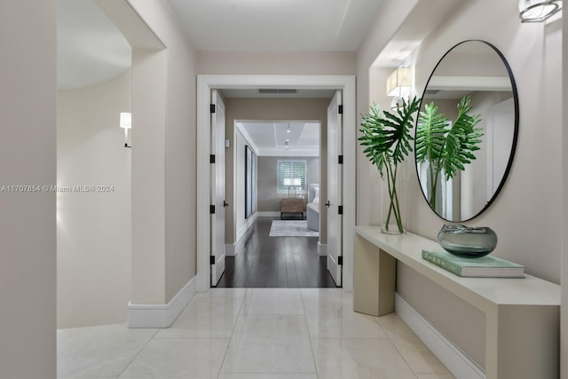 hallway with light wood-type flooring