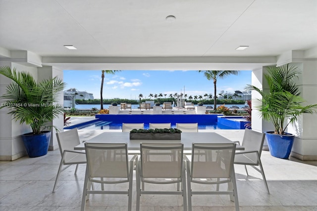 view of patio / terrace featuring a water view