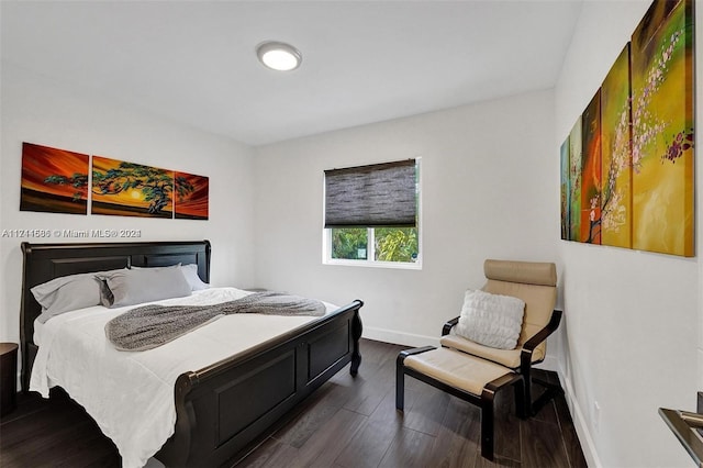 bedroom featuring dark hardwood / wood-style floors